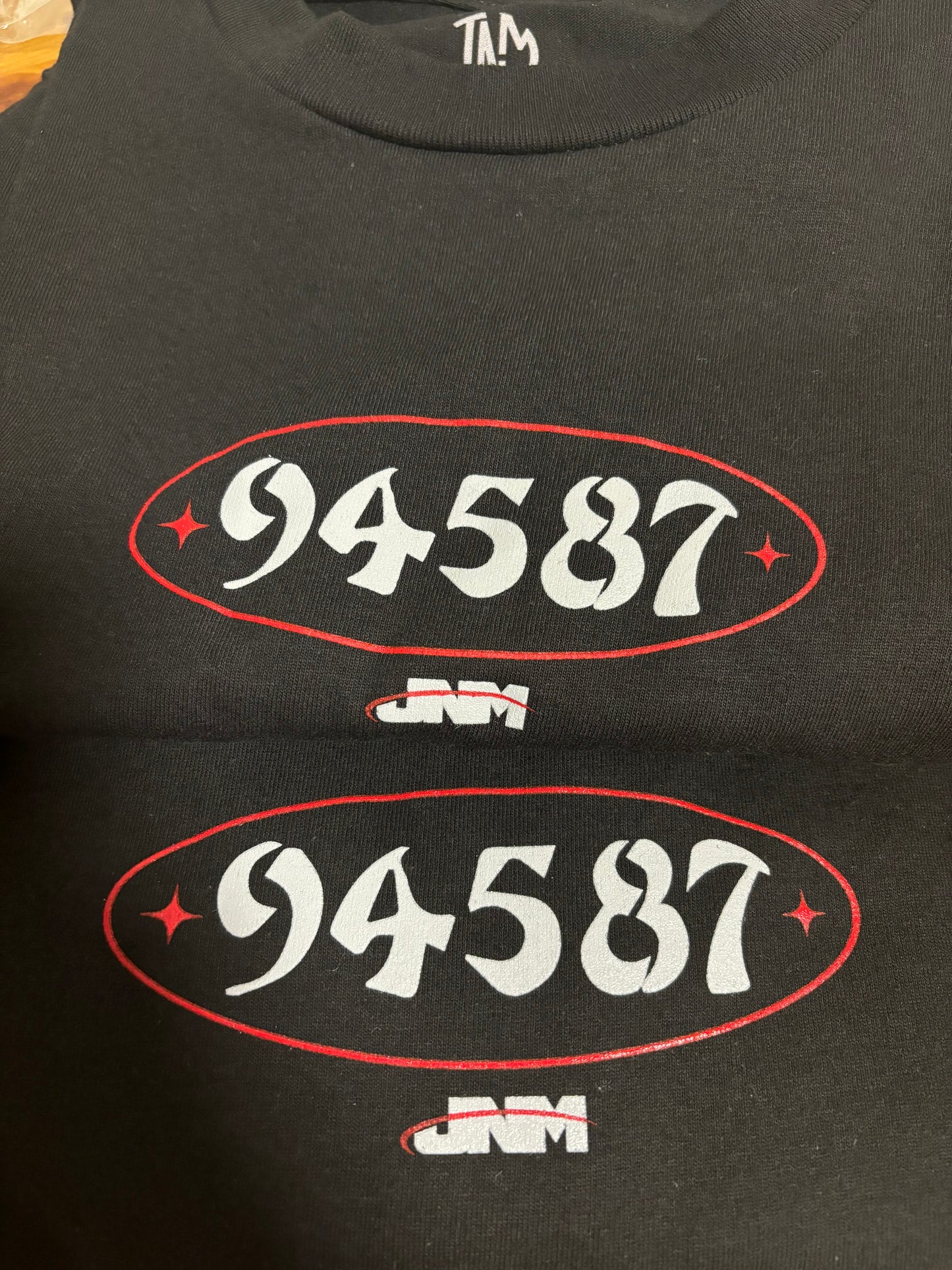 94587 JNM Swoosh
